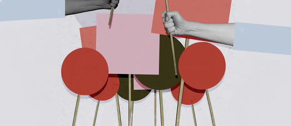 Hands holding up various signs made of different geometric shapes