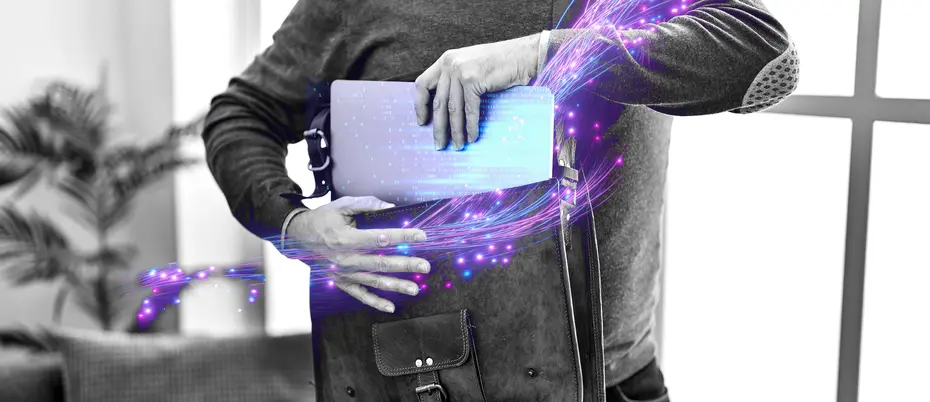 A person takes a laptop out of a laptop bag with binary code and other digital imagery 