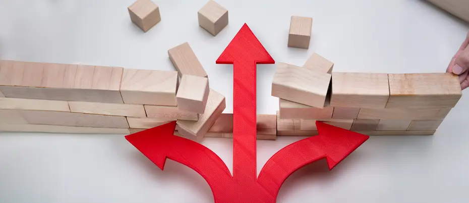 An arrow breaks through a wall of wooden blocks