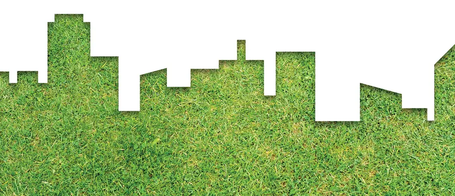 A city skyline silhouette made of grass