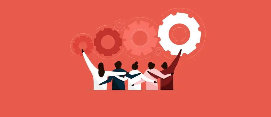 A team embraces each other in front of cogwheels