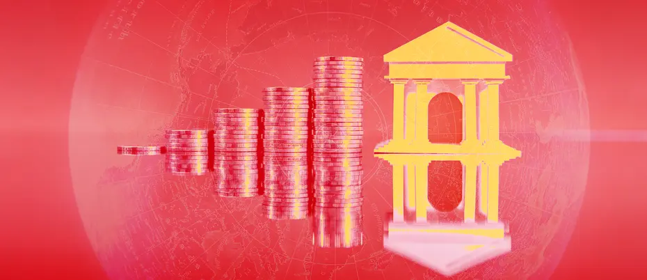 A reflection of stacking coins and a financial building in red and yellow