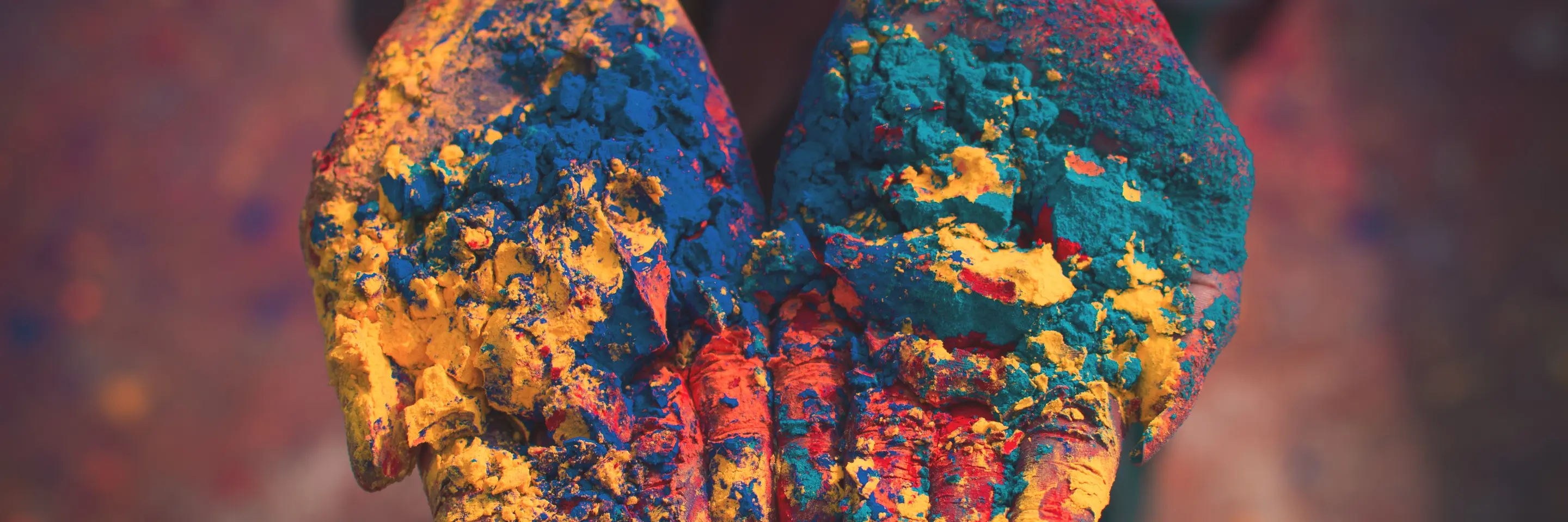 Woman holding color soils