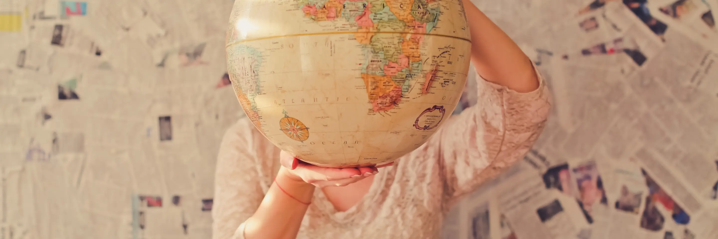 Woman holding globe