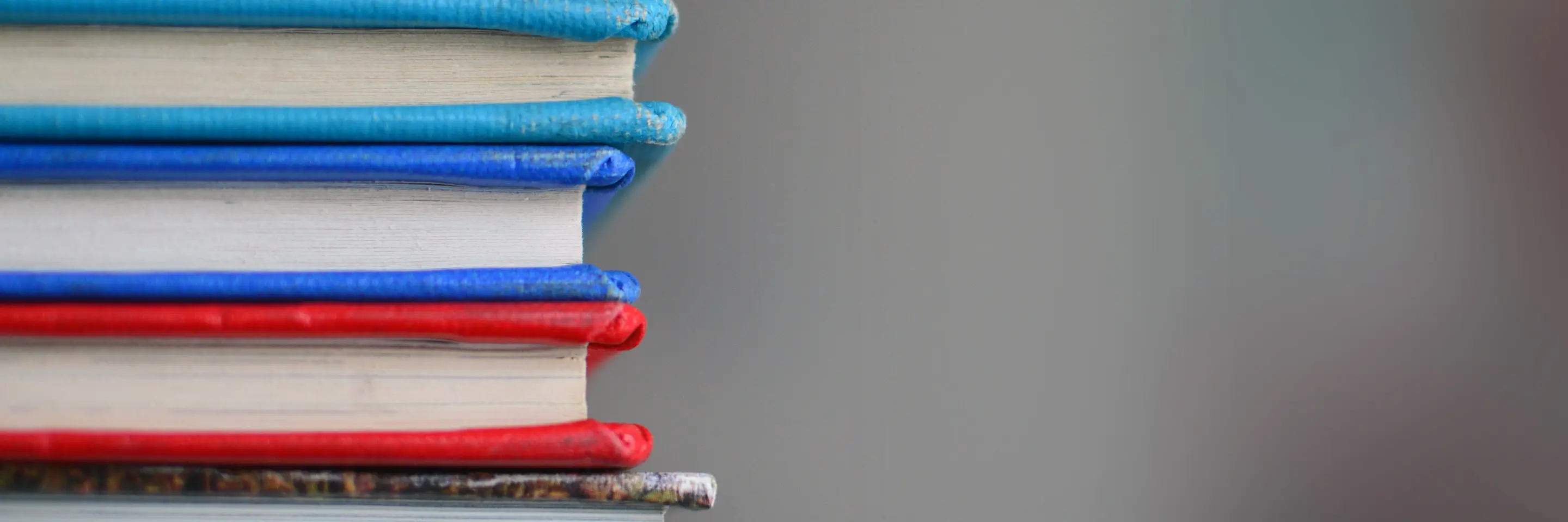 Close up photo of a stack of books 