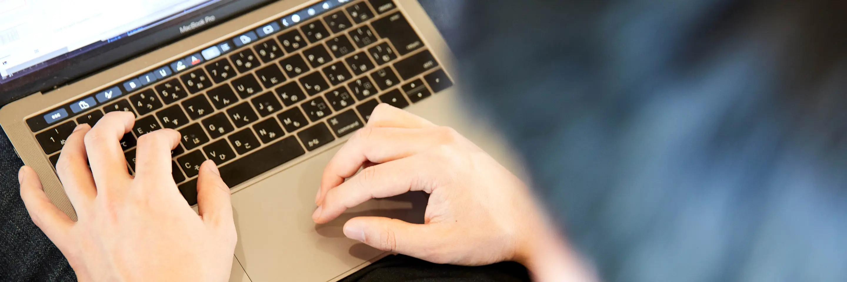 A photo of a student working on a computer