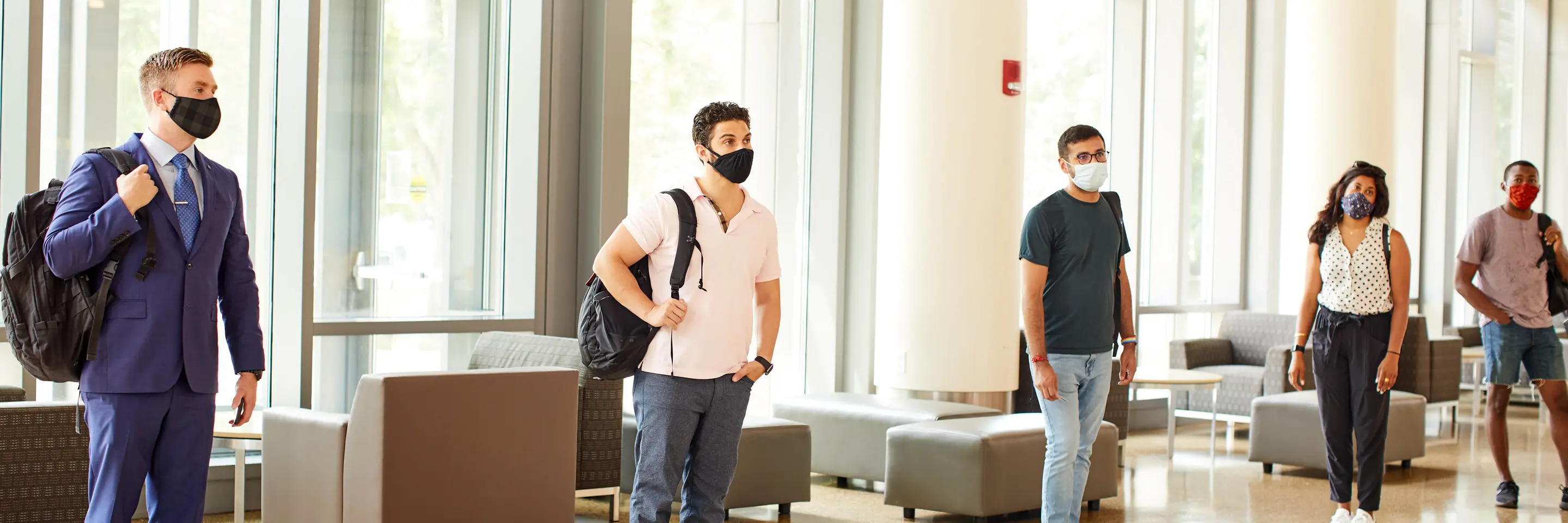 A photo of students socially distanced on campus