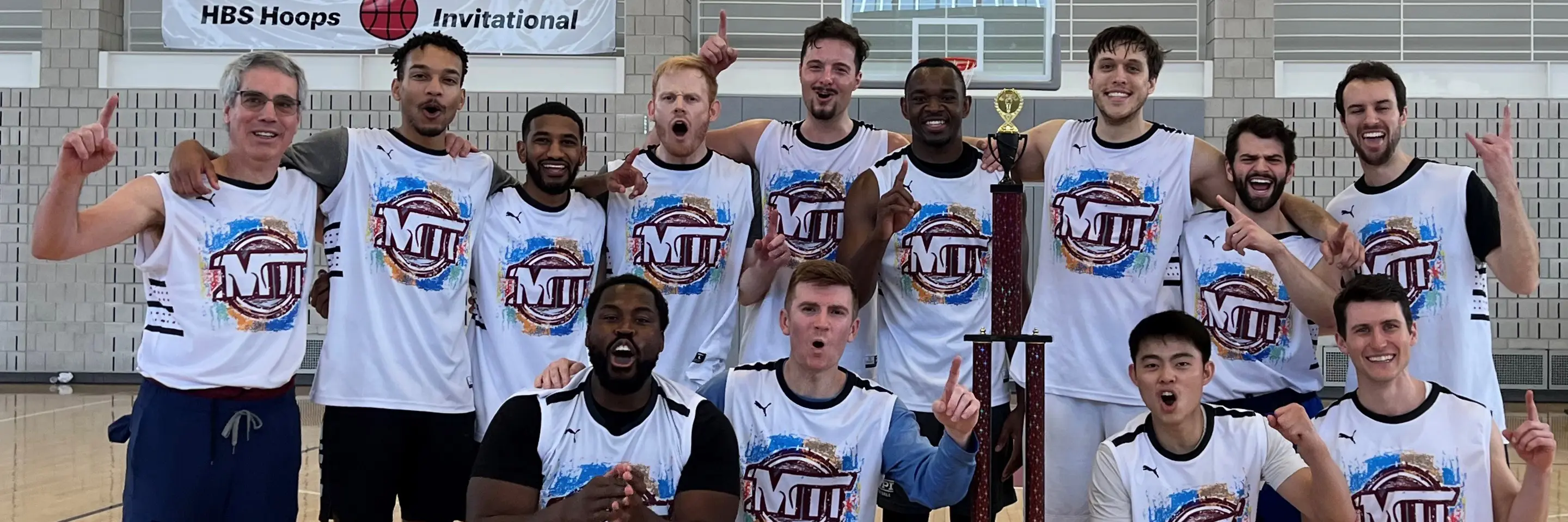 The MIT Sloan Basketball Club team poses for a group photo