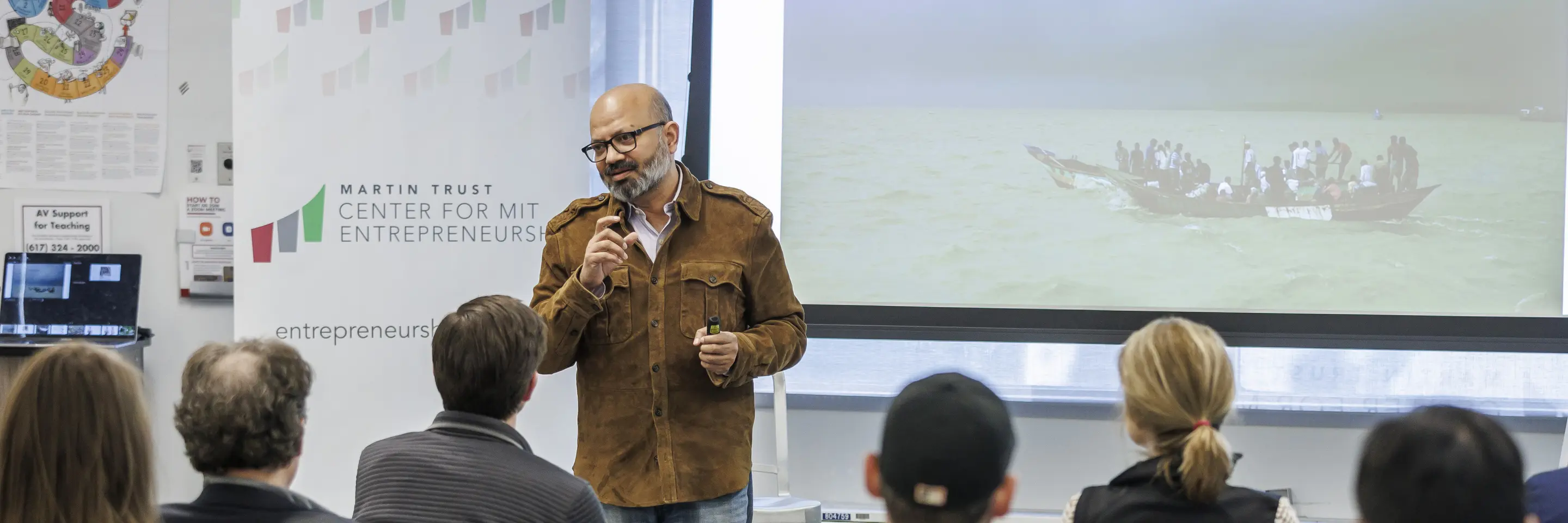 Kamal Quadir talks to students, faculty, and staff at the Trust Center