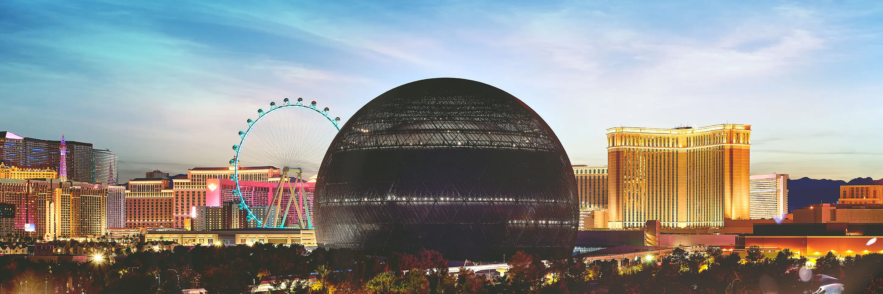 Las Vegas skyline at dusk with Sphere in foreground
