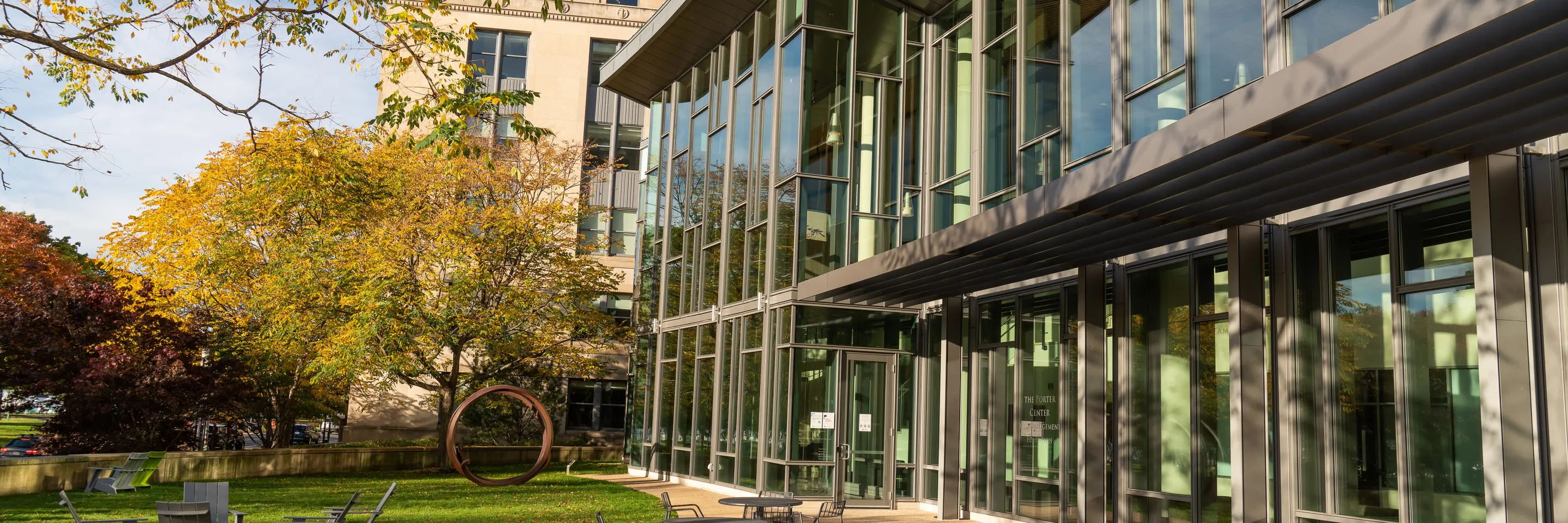 Back of MIT Sloan building on a sunny fall day