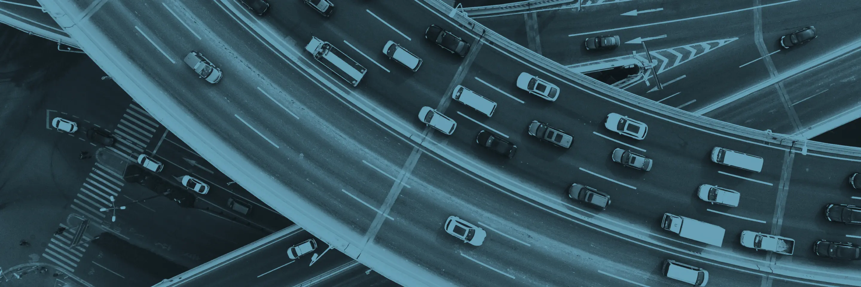 Single color image of cars driving on highway