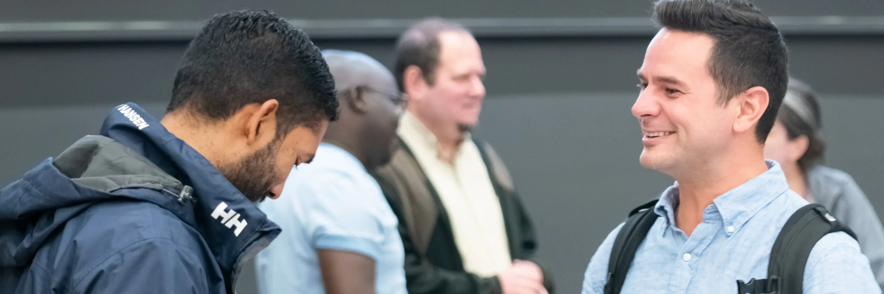Two male classmates talking