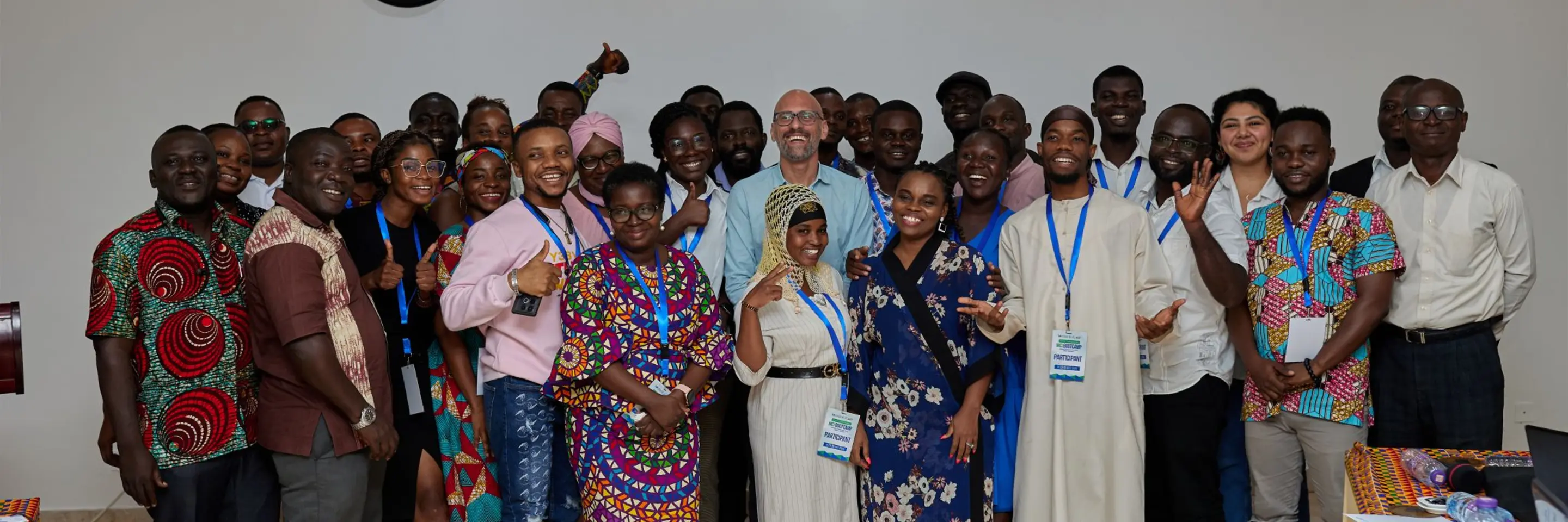 large group photo of people smiling together