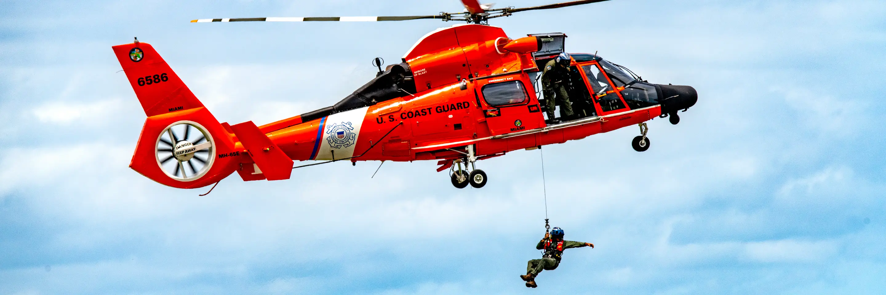 Coast Guard helicopter rescue at sea