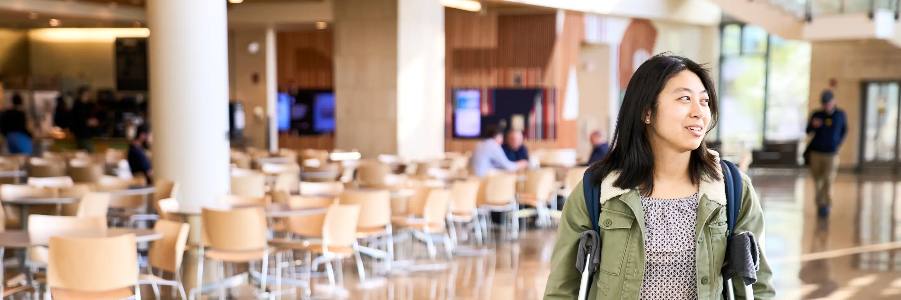 Megan Hung walks through the MIT Sloan building. 