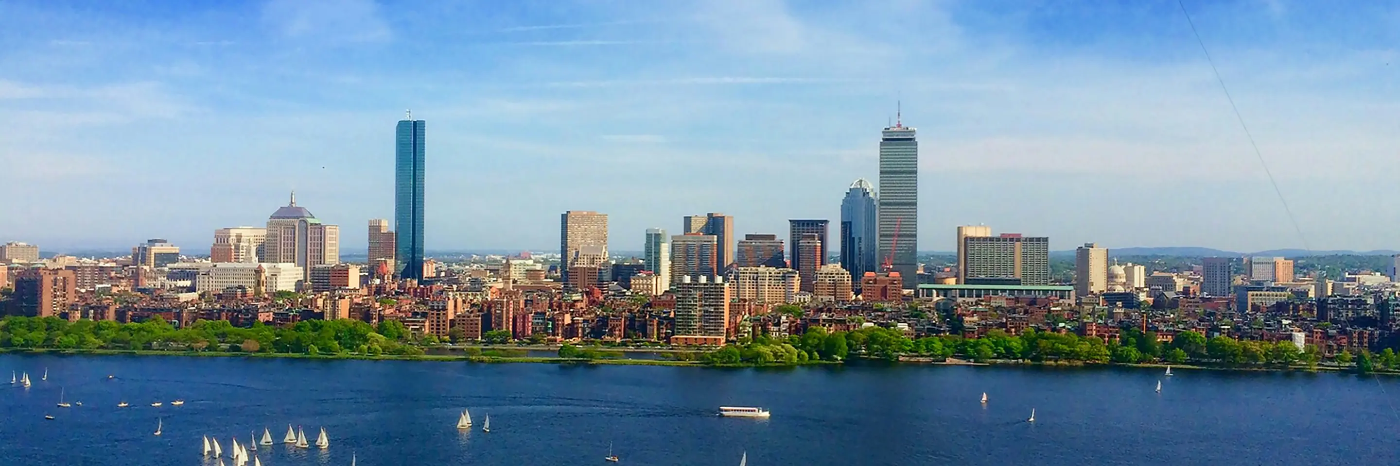 Image of the Boston skyline as seen from across the river in Cambridge