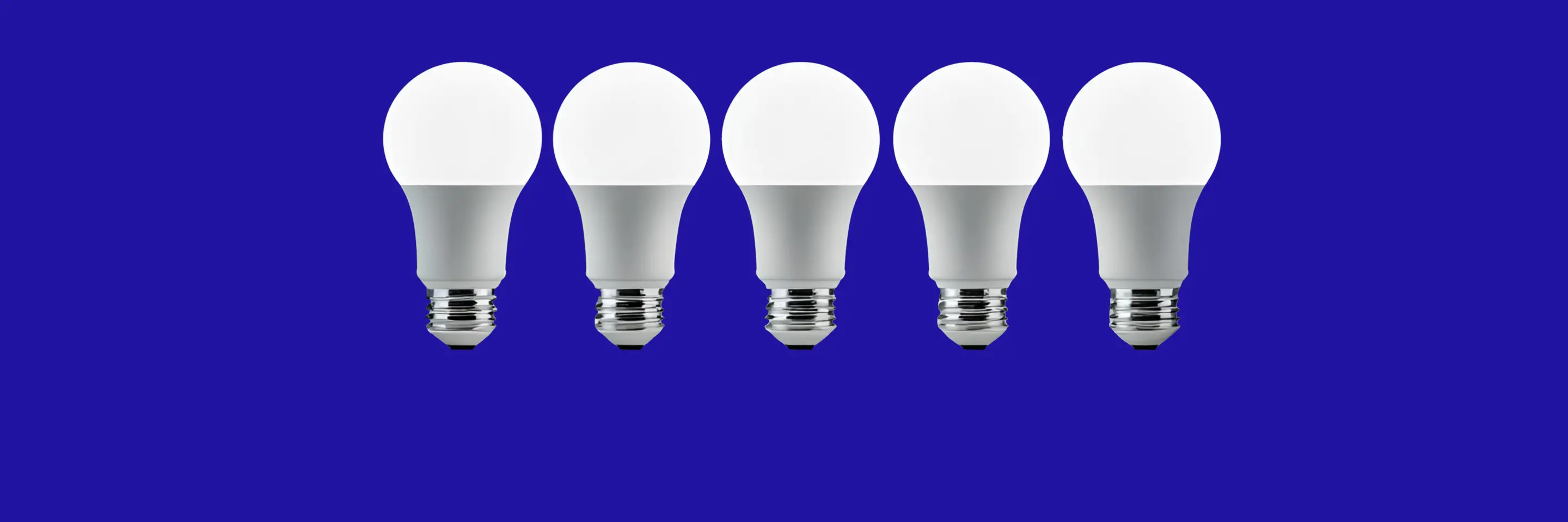 Five LED lightbulbs centered against a bright blue background.