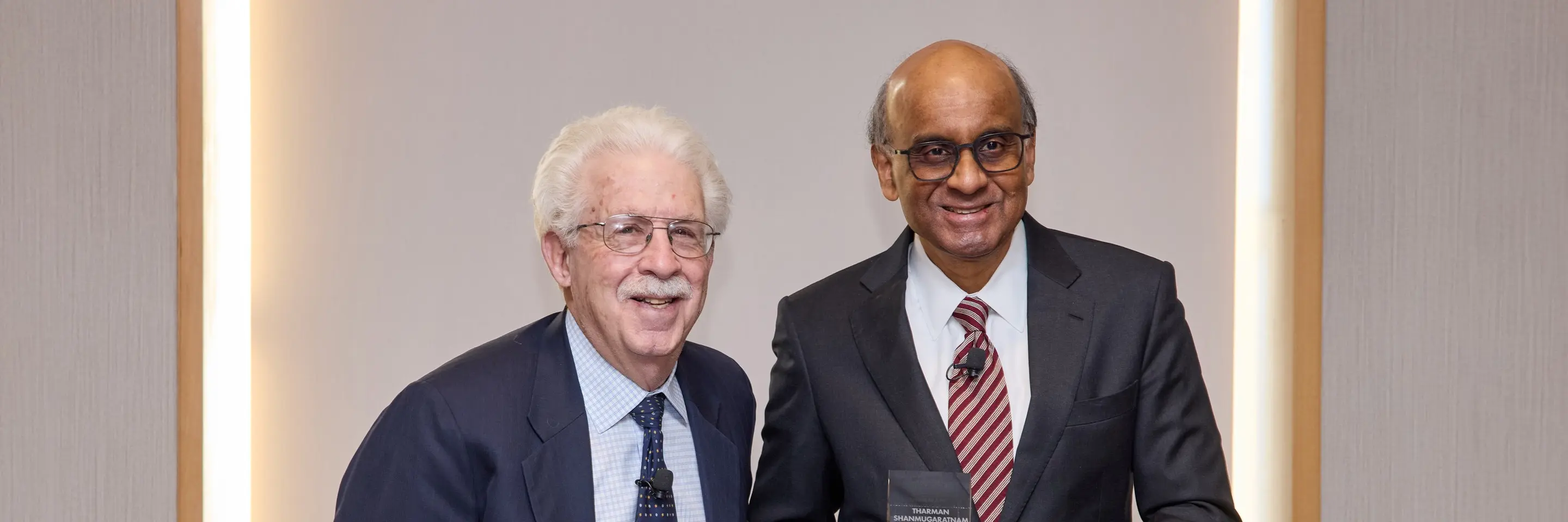 President Tharman Shanmugaratnam receiving the Miriam Pozen Prize from Bob Pozen