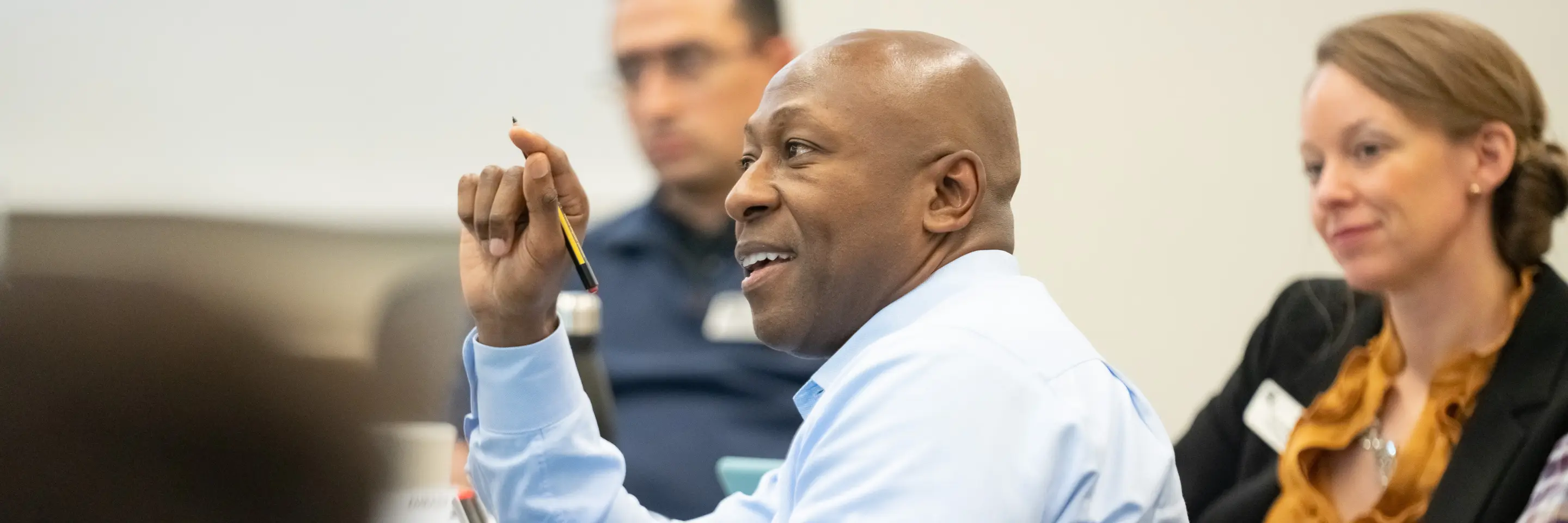 Patrick Parker, EMBA '24, in class answering a question