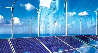 City buildings juxtaposed with solar panels and wind turbines