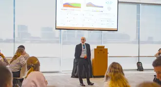 John Sterman presenting en-ROADS climate simulator tool