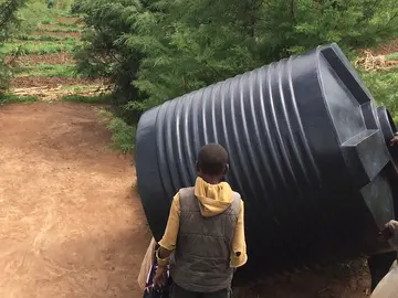 March 25, 2015. Gicumbi, Rwanda. Water tank installation.