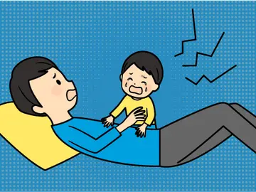 Distressed father holds crying child