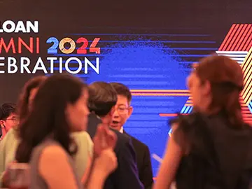 A group of people gather in celebration