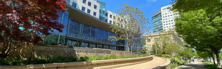 Daytime photo of the MIT Sloan School of Management building E62