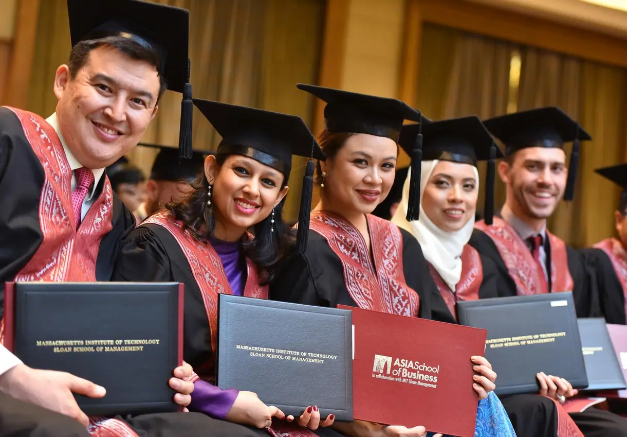 ASB 2019 Commencement graduates with diplomas