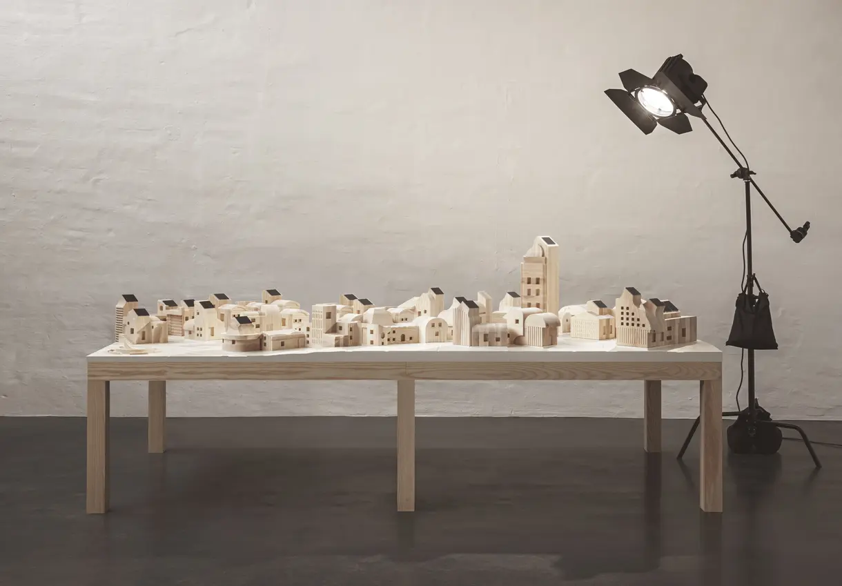 IKEA Space10's project - SolarVille, a 1:50 scale village made of wooden blocks, as an exercise in how a community might use two fast-growing technologies to power itself.