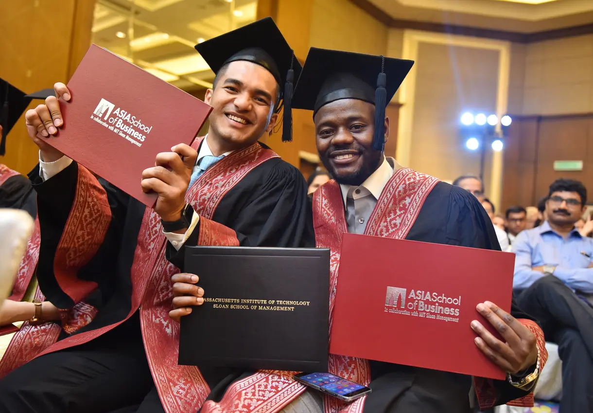 ASB 2019 Commencement graduates with their diplomas