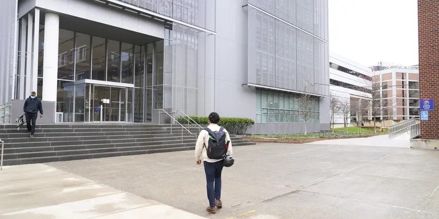 Nikhil walking away from the camera