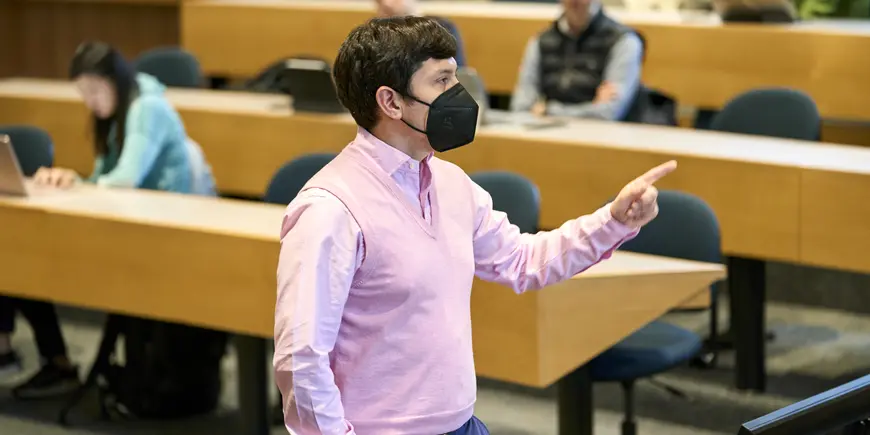 Professor Alexis Montecinos giving a lecture