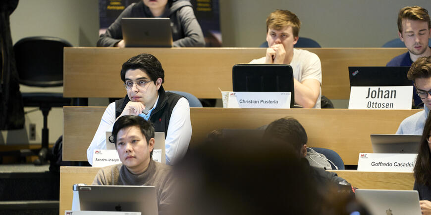 Sandro Joseph and other students listening in class