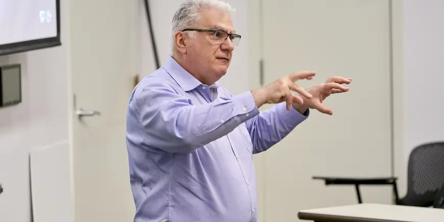 Professor Athanasios Orphanides giving a lecture