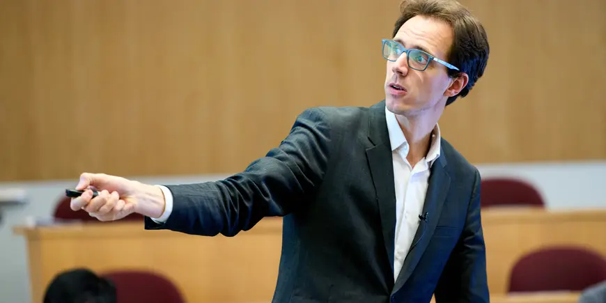 Tom in his last class of the day is Integer Optimization with Professor Alexandre Jacquillat,