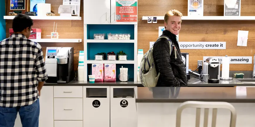 Thomas Wright grabbing a coffee at the Martin Trust Center