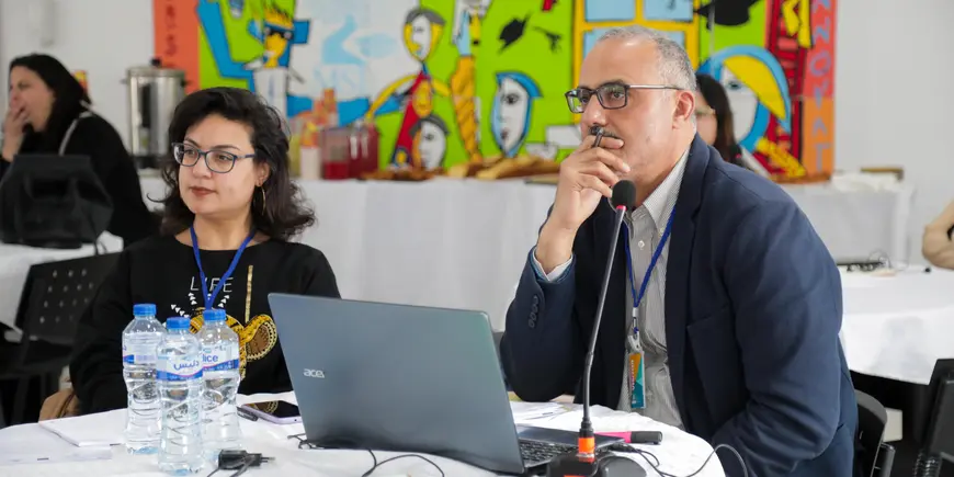 Emna Hayyouni and El Akrem Hayyouni sitting at a table