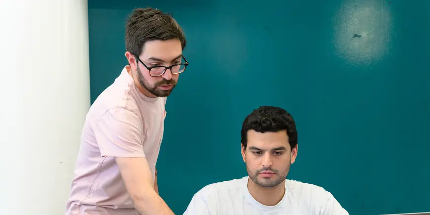 Two students review their notes