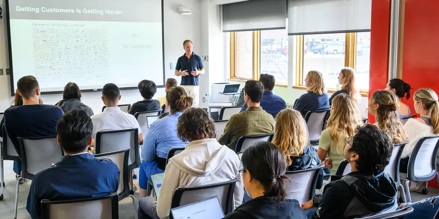 Presenter speaks to classroom