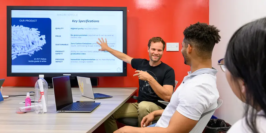 Students discuss an upcoming presentation