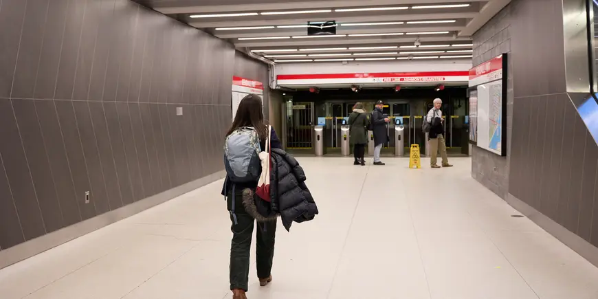 Jocelyn, a student, heads home on the red line subway line.