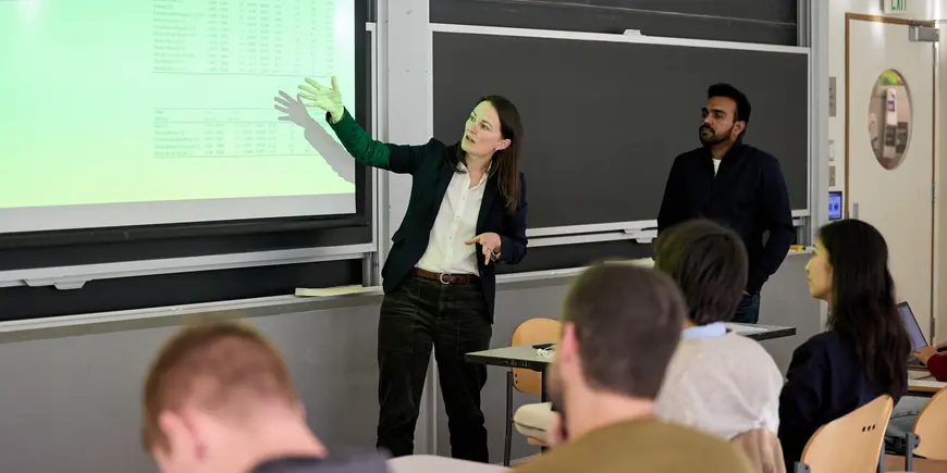 Jocelyn, a student, presents in front of her class.