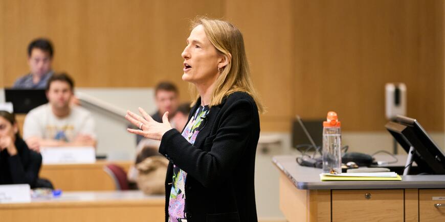 Professor Kate Kellogg lectures in her class.