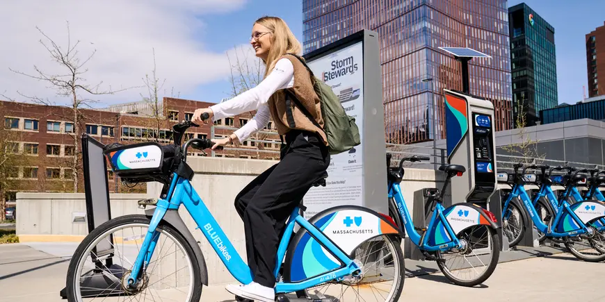 Anne Buisson rides her bike to class.