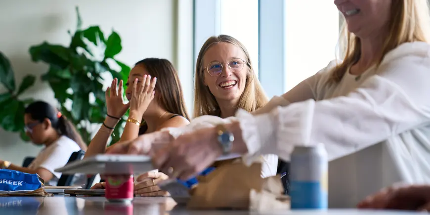 Anne Buisson meets with her classmates.