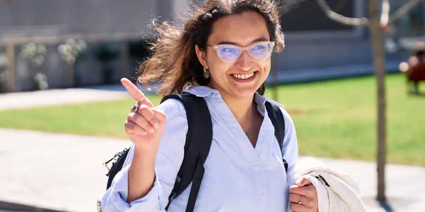 Khushi Pathak walks outside.