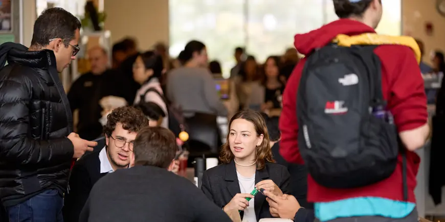 Benedetta Magni eats lunch with her friends at a campus cafeteria.
